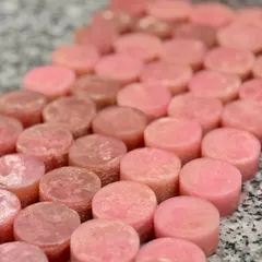 These custom Loofah Soaps were made as baby shower favors. We created two unique scents, a fruity-berry and a classic champa, in a cute 60-gram bar size for guests to take home.