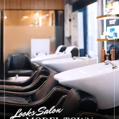Our state-of-the-art hair wash stations are designed for ultimate comfort and relaxation, allowing you to lie back and enjoy a soothing scalp massage.