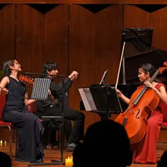 Our Note Bene Trio in performance, showcasing the seamless interplay between violin, cello, and piano that is the hallmark of excellent chamber music.