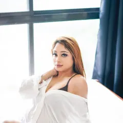 This shot captures a relaxed and comfortable moment, showcasing my ability to make clients feel at ease in front of the camera for authentic portraits.