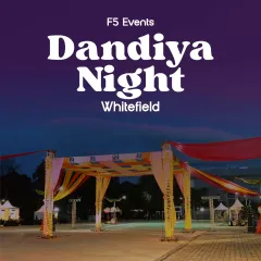This is how a celebration begins. I designed and built this grand entrance for a Dandiya Night in Whitefield, using vibrant drapes and structured trussing to create an inviting and festive atmosphere from the very first step.