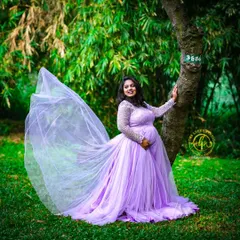 For this serene maternity photoshoot, I provided a flowing lavender gown and styled the mother-to-be with soft, glowing makeup and gentle waves in her hair to create this beautiful, ethereal look.