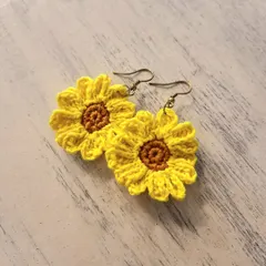 I love bringing a bit of nature into my work. These handmade crochet sunflower earrings are so cheerful and bright, perfect for adding a pop of color and sunshine to your day. They are lightweight and crafted with detailed stitching.