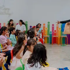 "What do you think is inside the bag?" I keep my shows very interactive, constantly talking with the kids and getting them to guess what will happen next. Their excitement and laughter make the show.