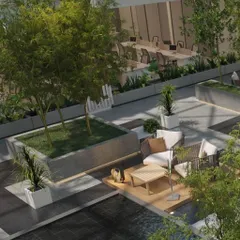 At the heart of the Hamdard HQ in New Delhi, we designed a biophilic central courtyard. This light-filled atrium, featuring trees and informal seating, serves as a green lung for the office, promoting employee wellbeing and providing a serene space for pause and collaboration.