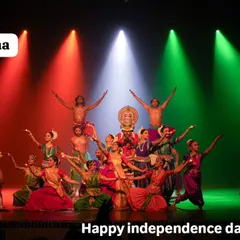 A patriotic tableau celebrating Independence Day. The stage is bathed in the colours of the Indian flag, with my entire troupe posing to represent national unity.