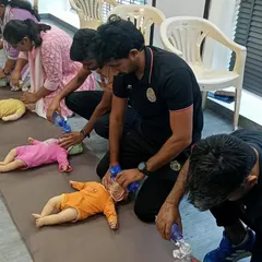 Practicing CPR techniques for infants. The methods differ significantly from adult CPR, and this specialized training ensures I am knowledgeable about providing aid to all age groups.