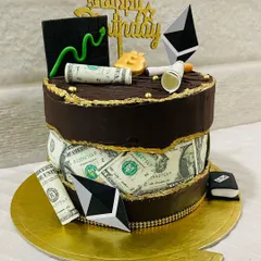 Your passions, baked into a cake. This custom two-tier design was for a crypto enthusiast, featuring edible money, Ethereum symbols, and a Bitcoin topper on a rich chocolate cake.
