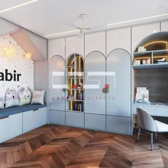This personalized kids' room features a cozy window seat, custom-built wardrobes with arched details and open shelving for books, and a dedicated study nook.
