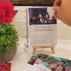 I create custom desk calendars using your 12 favorite photos. This version includes a set of monthly cards and a small wooden easel, making it a beautiful and personal addition to any desk or shelf.