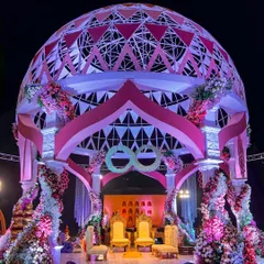 This is our 'Anant' theme, symbolizing an endless love. The magnificent dome mandap, inspired by the sacred Flower of Life, creates a truly spiritual and awe-inspiring centerpiece for the wedding ceremony.