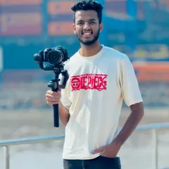 A quick photo of me during a shoot, holding the camera rig. I believe in using the right tools for the job to deliver the best quality work for my clients.