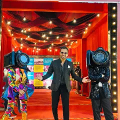 Posing with themed performers at the Zydus Finance Family Day. I work closely with event planners to ensure every element, including my own presence, aligns perfectly with the corporate event's theme and brand.