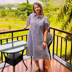 A guest enjoying the view from her balcony. This photo, shared by a visitor, perfectly encapsulates the peace and contentment that our serene environment fosters.
