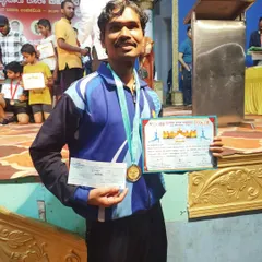 Proudly holding my first prize certificate and medal from the Mysore Dasara competition. Success in these events is a result of rigorous and structured training.