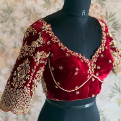 The front of the same maroon velvet blouse, featuring a sweetheart neckline and delicate pearl detailing that drapes beautifully.