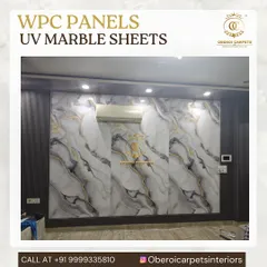 Here, multiple UV marble sheets are used to cover a large wall, creating a seamless and expansive marble effect. This is a great way to make a room feel larger and more luxurious.