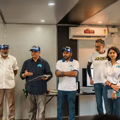 The organizing team and instructors addressing the participants at the EV racing festival. Collaboration is key to making these groundbreaking events a success.