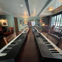 The calm before the storm! Our mentors setting up a long table of keyboards, getting ready for a full house at our Soho House workshop.