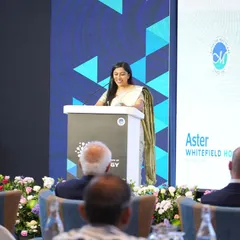 A moment of connection with the audience while speaking at the Aster Whitefield Hospital launch. My style is professional yet approachable, even in the most formal settings.
