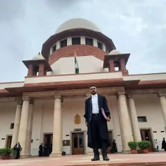 In my capacity as an Advocate at the Supreme Court, prepared to argue a complex commercial case. Each appearance is an opportunity to uphold the principles of justice for our clients.