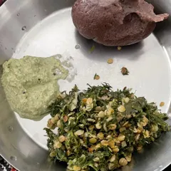 A classic client meal of Ragi Mudde (finger millet ball) with a nutritious greens and lentil stir-fry, demonstrating a high-fiber, calcium-rich traditional option.