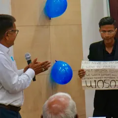 The reveal. Here I am showing my prediction, which matched the lottery number the director was thinking of. This is the power of mentalism.