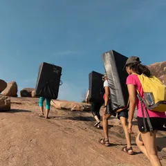 On our way to the crag, carrying the crash pads that will keep us safe. We are thankful for the outdoor spaces that allow us to pursue our passion.
