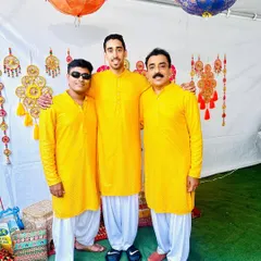 Happy clients celebrating a Haldi ceremony in our matching bright yellow kurtas. We love creating coordinated looks for the whole family to enjoy festive moments together.