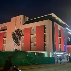 The completed St. John’s Hospital on Kanakpura Road, illuminated at night. This project showcases my capability in handling large-scale institutional architecture, blending modern functionality with a welcoming design aesthetic.