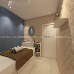 Another view of a spa treatment room, showcasing a patterned accent wall and practical storage solutions. The design ensures all necessary tools and products are within easy reach for the therapist while maintaining a clean and serene environment for the client.