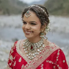 A close-up of the bride's happy, natural smile. Her joy is what makes this portrait so beautiful.