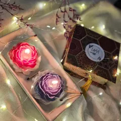 My Scented Peony Candles, lit and glowing, create a world of timeless elegance and tranquility. They come in a premium box, making them a perfect gift for Diwali, housewarmings, or any special occasion.