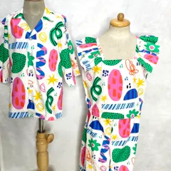 Fun and festive holiday looks for siblings. This abstract print is used to create a cool shirt for the brother and a matching dress with ruffled sleeves for the sister.