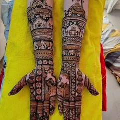 I can bring your wedding story to life with detailed figure work. This design shows a full baraat procession with doli, elephants, and musicians, creating a masterpiece on your arms.