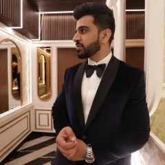 A real client moment. For his sister's wedding, he needed an outfit that was both classic and memorable. We crafted this suave, bespoke black velvet tuxedo to ensure he looked his best for the special occasion.