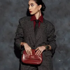 This shot shows how the makeup works with accessories to create a complete, cohesive story for a fashion editorial.