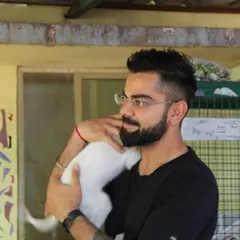 Fierce on the field, but gentle with our feline friends. Virat Kohli sharing a cuddle with one of our shelter cats. Support from public figures helps amplify our message of kindness to animals.