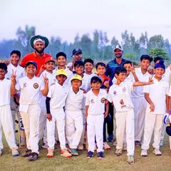 A happy group of young cricketers after a practice match during the holidays. The smiles and peace signs say it all about the fun-filled atmosphere at our camps.