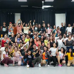 This picture captures the incredible turnout and excitement of a Zumba fitness party. I can scale this experience for any corporate event, ensuring a huge number of employees can participate at once.