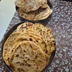 For a large party order, I single-handedly prepared 100 fresh, hand-rolled stuffed parathas. I take pride in managing large-scale catering orders myself to guarantee consistent, homemade quality in every single dish.