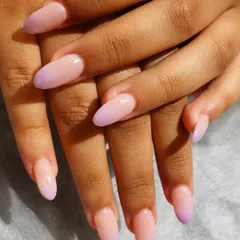 A soft and dreamy lavender ombre. This design features a gentle fade from a natural nude base to a beautiful pastel purple at the tips, perfect for a subtle pop of color.