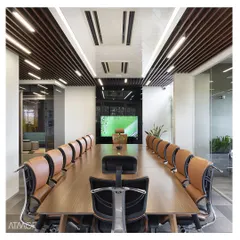This executive boardroom for ABC House was designed to be both impressive and functional. The wood-paneled table, ergonomic chairs, and integrated audiovisual technology create a sophisticated environment for important meetings.