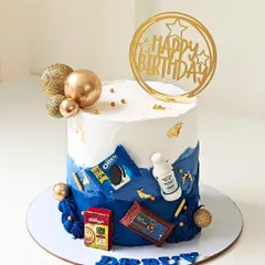 A fun birthday cake for a snack lover, decorated with miniature, edible versions of Oreo, Kellogg's Corn Flakes, and a protein bar.