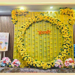 Soaking in the golden glow of a beautiful Haldi ceremony. We designed this stunning backdrop using a full circle of vibrant yellow marigolds and delicate draping to create a traditional yet fresh look for the bride-to-be.