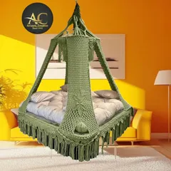 The same beautiful rectangular bed swing, this time in a calming olive green. This shows how the same design can have a completely different feel with a new color.