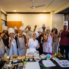 A proud moment from our January 2024 retreat. Here, the participants have just learned how to make the perfect masala chai without any dairy, using dates for sweetness. It's all about learning to recreate your favorite comfort foods in a healthy, healing way.