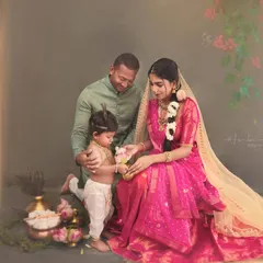 The whole family joins in to create this mythological narrative. Here, the father looks on as his little Krishna interacts with his mother, a beautiful moment of connection within our artistic setup.
