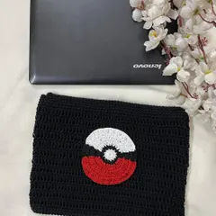 This image shows the Pokémon laptop sleeve from a slightly different angle, emphasizing its soft, handmade texture.