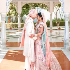 A portrait of a couple at The Leela Palace, Jaipur, where the setting is as much a part of the story as their love. The architecture provides a stunning canvas for creating elegant and timeless wedding photographs.